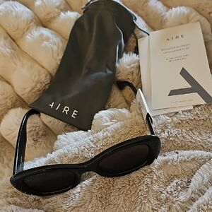 AIRE Black Oval Sunglasses